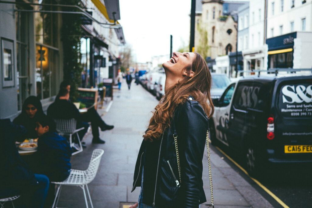 laughing woman looking to the sky