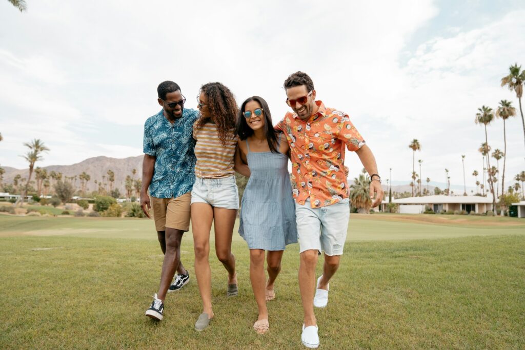 four friends walking outdoors