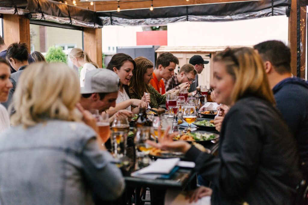 lots of friends at a dinner table