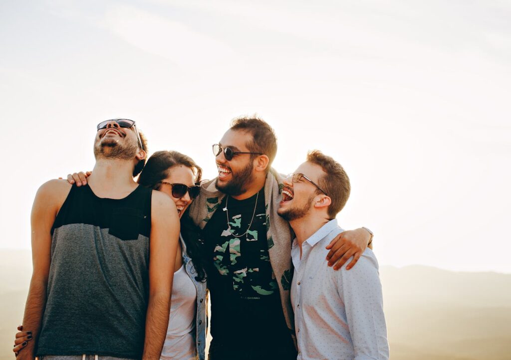 friends laughing on beach